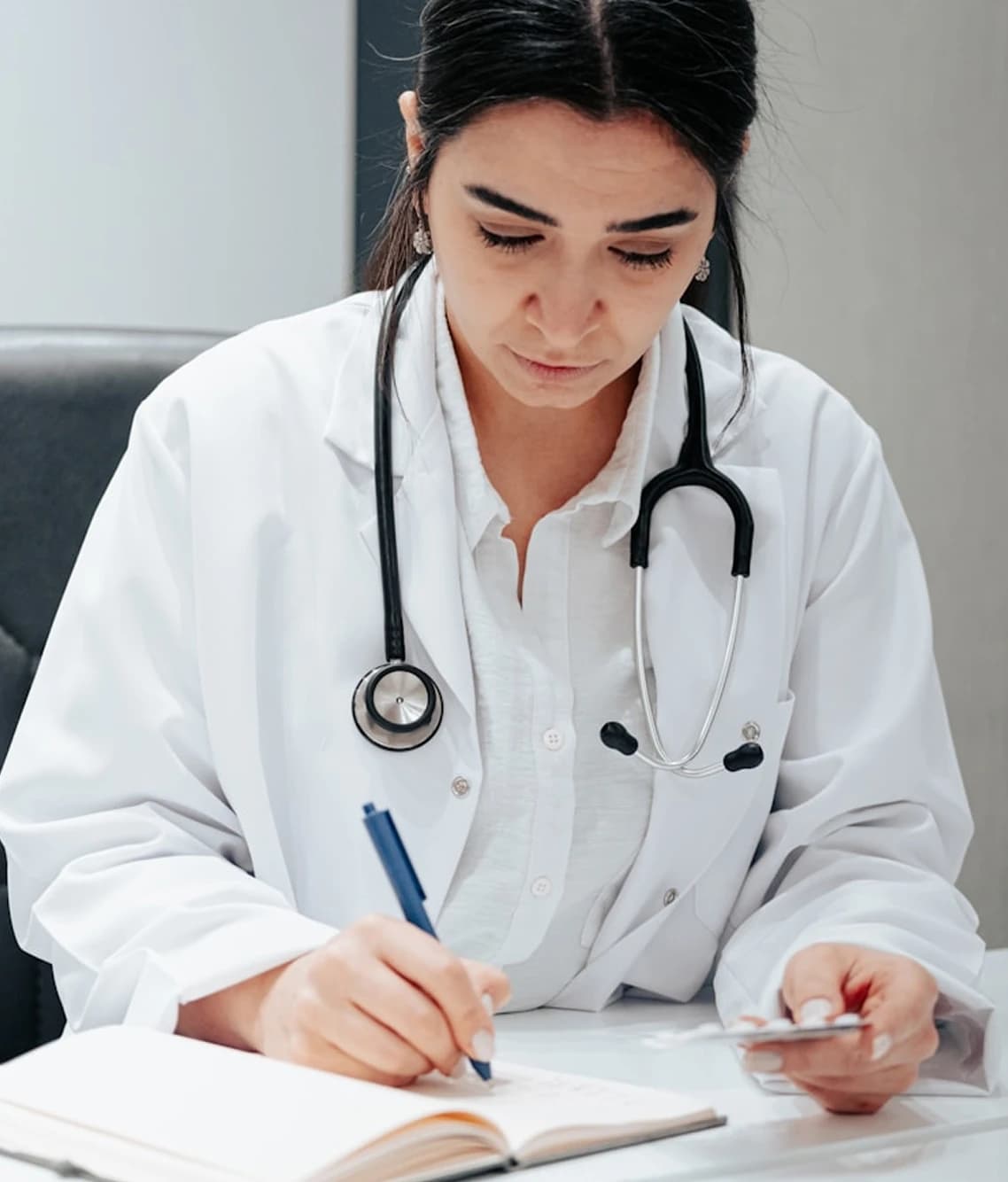 Physician taking notes